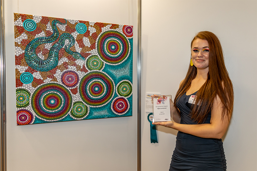 Kiya Watt with her piece Wagual, highly commended in the 2019 Emerging Artist Award Aboriginal Artist Award category.