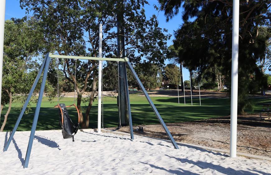 Childrens swing set outdoors at playground