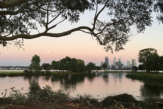 Alakewiththecityinthebackground