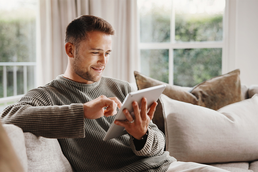 Man using a tablet device