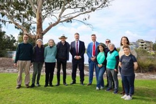 GroupphotoofUrbanGreeninggrantrecipientswithGeoffBakerandMayorGregMilnerstandingatLakeDouglas