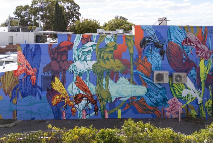 A wall mural of flora in abstract colours.