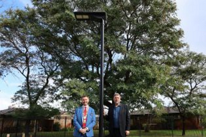MayorGregMilnerandGeoffBakerMLAMemberforSouthPerthinfrontofoneofthenewsafetylightsinKarawara