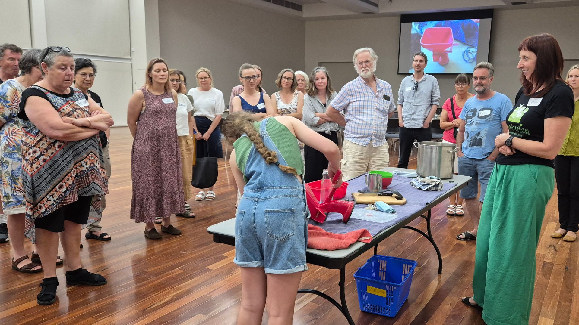 People watching a workshop demonstration