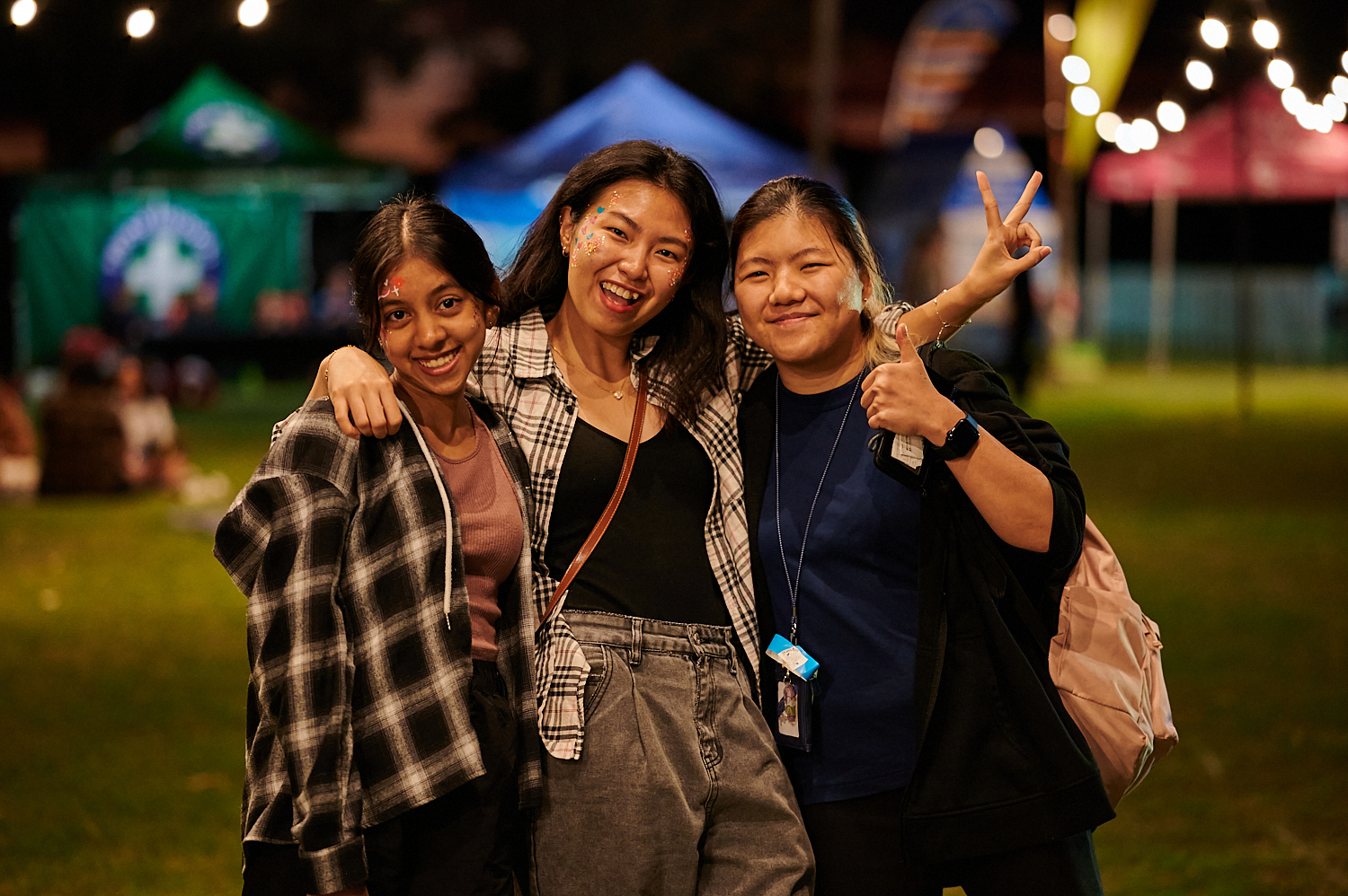 Three people at NEON Youth Festival 2023