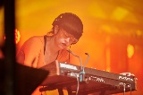 Music artist performing with keyboard at NEON Youth Festival 2023