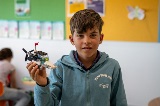 Boy holding LEGO