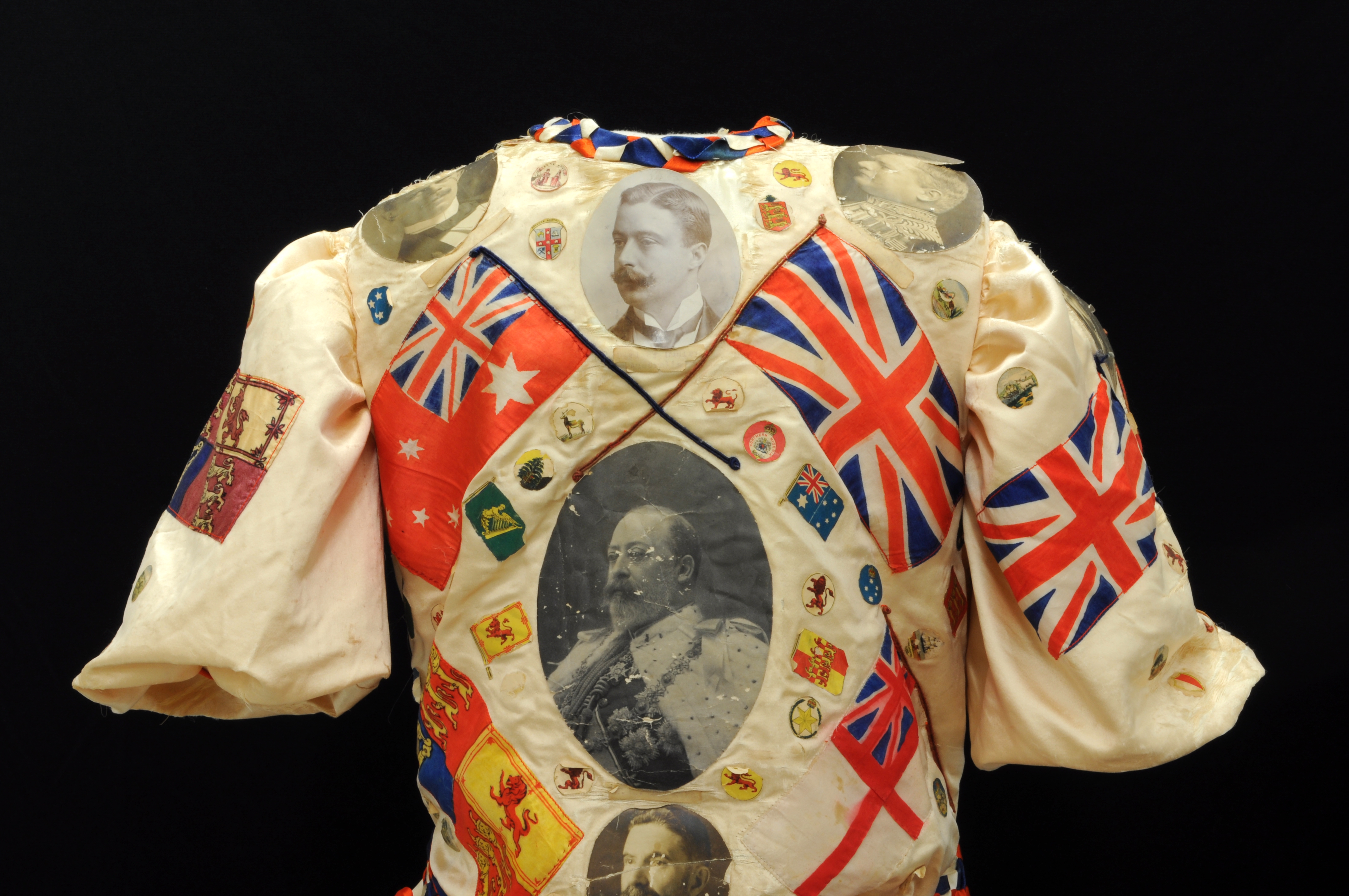 Old dress with Great Britain flags and emblems sewn on