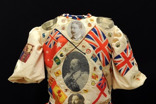 OlddresswithGreatBritainflagsandemblemssewnon