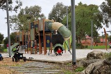 Children playing on new play equipment at Bill McGrath Reserve in Kensington