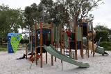 Children playing on new play equipment at Bill McGrath Reserve in Kensington