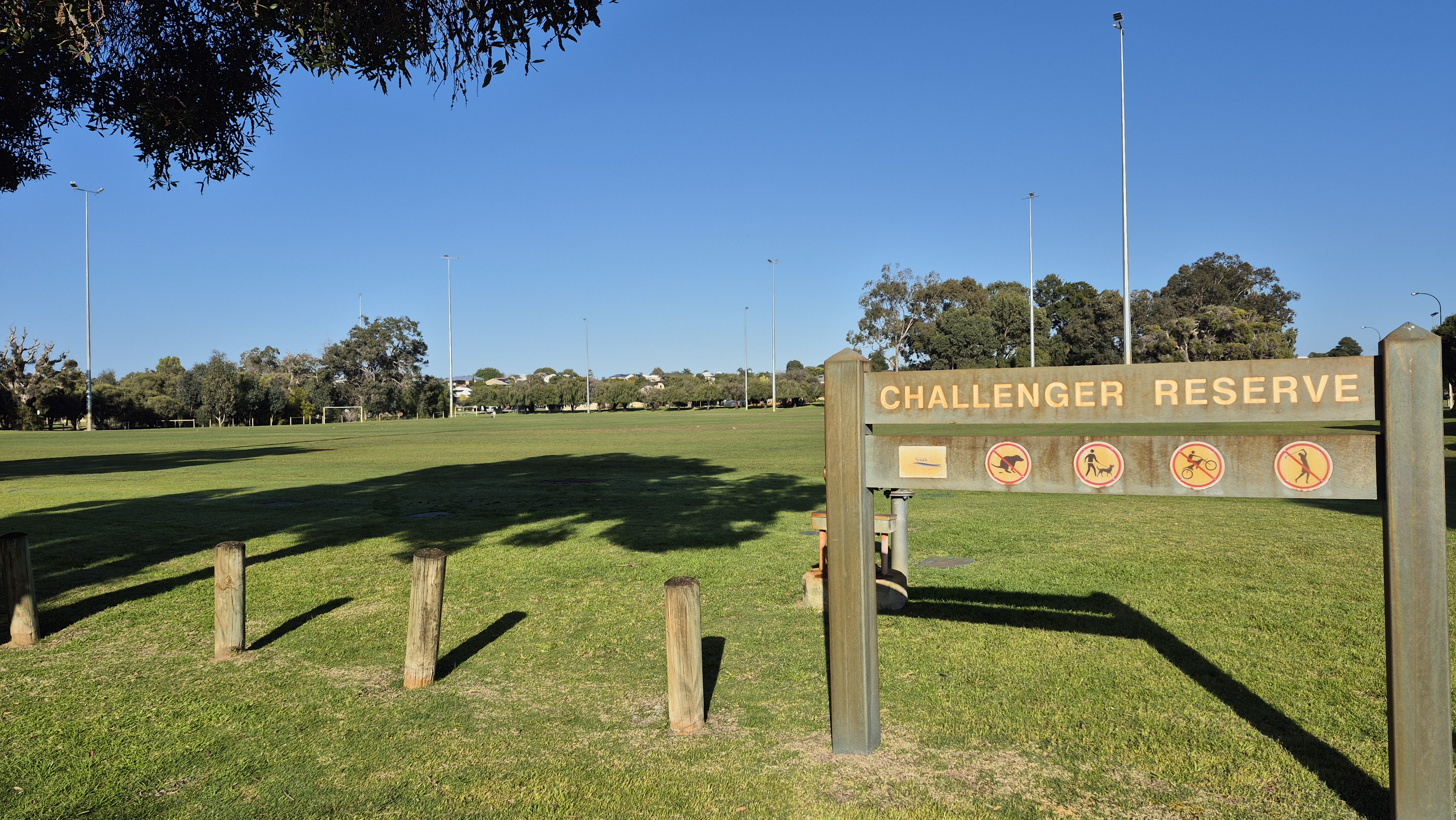 parkland with a sign that reads