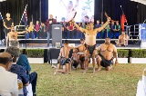 A group of men dancing.