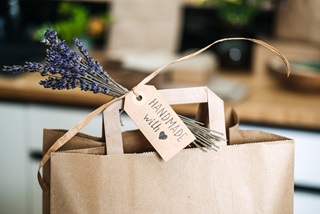 AbrownpaperbagwithatagthatreadsHandmadewithlove