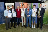 Agroupofpeopleholdingawards