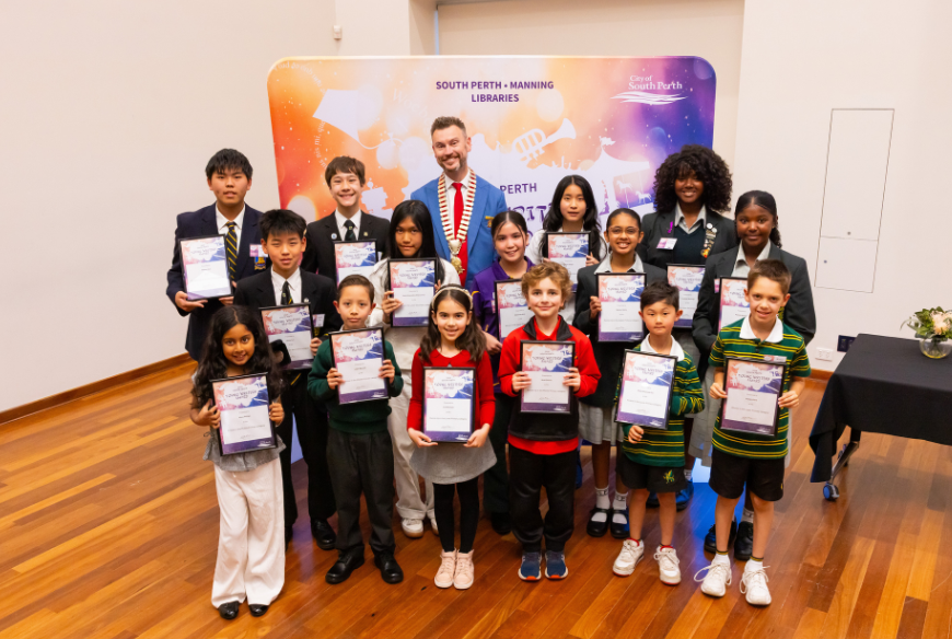 group picture of mayor with winning children.