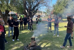 Crowd gathered at park for cultural experience
