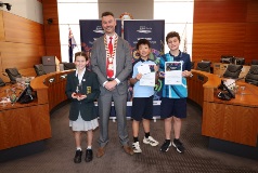 Mayor Greg Milner pictured with students with their Speak with Confidence Awards inside the Council Chamber.