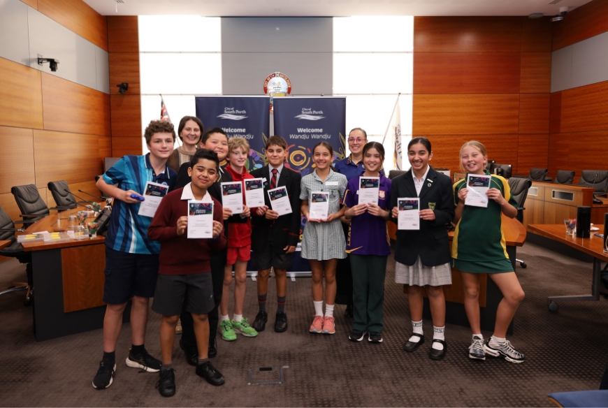 Students with their Speak with Confidence Awards inside the Council Chamber.