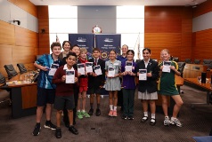 Students with their Speak with Confidence Awards inside the Council Chamber.