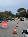 VehiclesqueueingattheBillGraydenReservecarparktodropoffhouseholdhazardouswaste