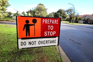 AsignonasuburbanstreetthatsaysPreparetostopDoNotovertake