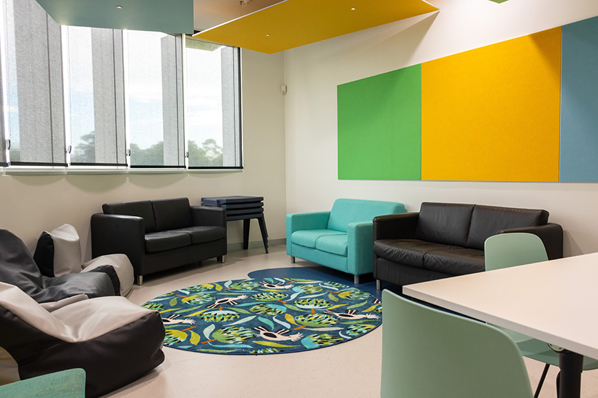 Colourful furniture in a white room