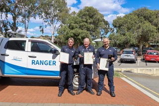 Threerangersreceivinganaward