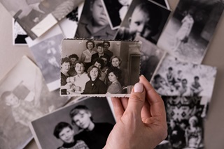 Handholdinganoldblackandwhitephotograph