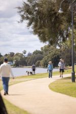 People walking along the South Perth foreshore.