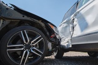 Acarthatscrashedintothesideofanothercar