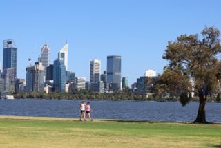 Twowomenwalkingalongtheforeshore