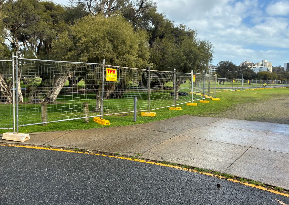 The temporary fencing at the Coode Street riverbank