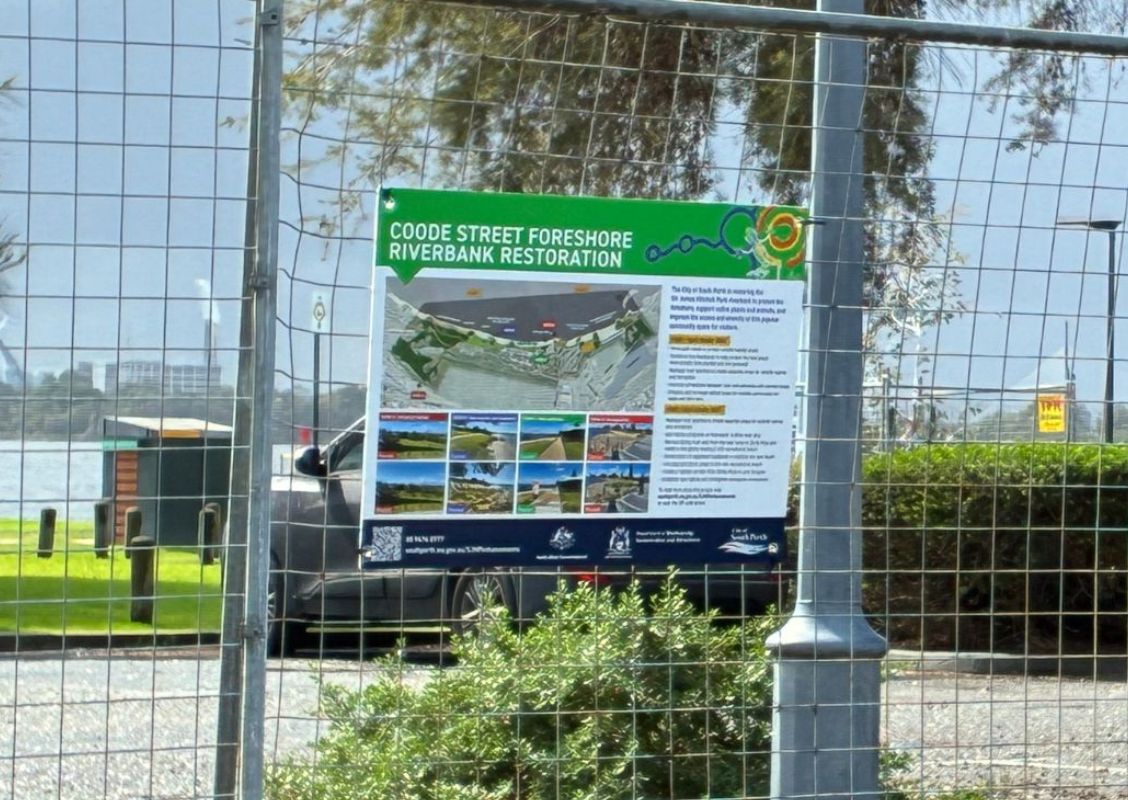 The temporary fencing at the Coode Street carpark with a sign about the project