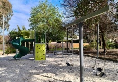 The swing set and spiral slide