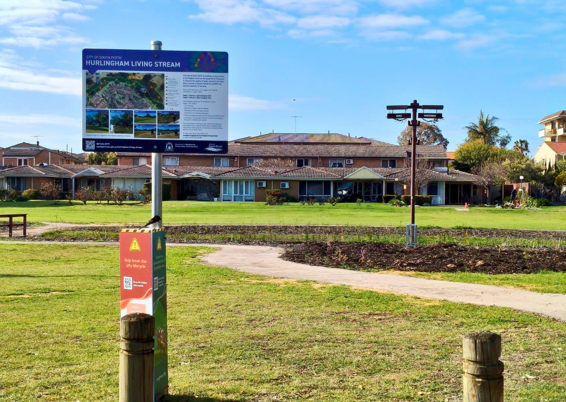 The Hurlingham Living Stream sign, with the Cockitrough in the background