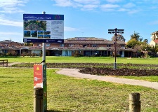 The Hurlingham Living Stream sign, with the Cockitrough in the background