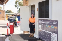 A Workpower employee at the Recycling Centre boom gate