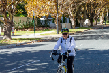 Womanridingabikeonasuburbanstreet