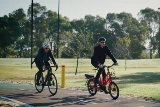 twomenridingbicyclesonnewbikepathinCityofSouthPerth