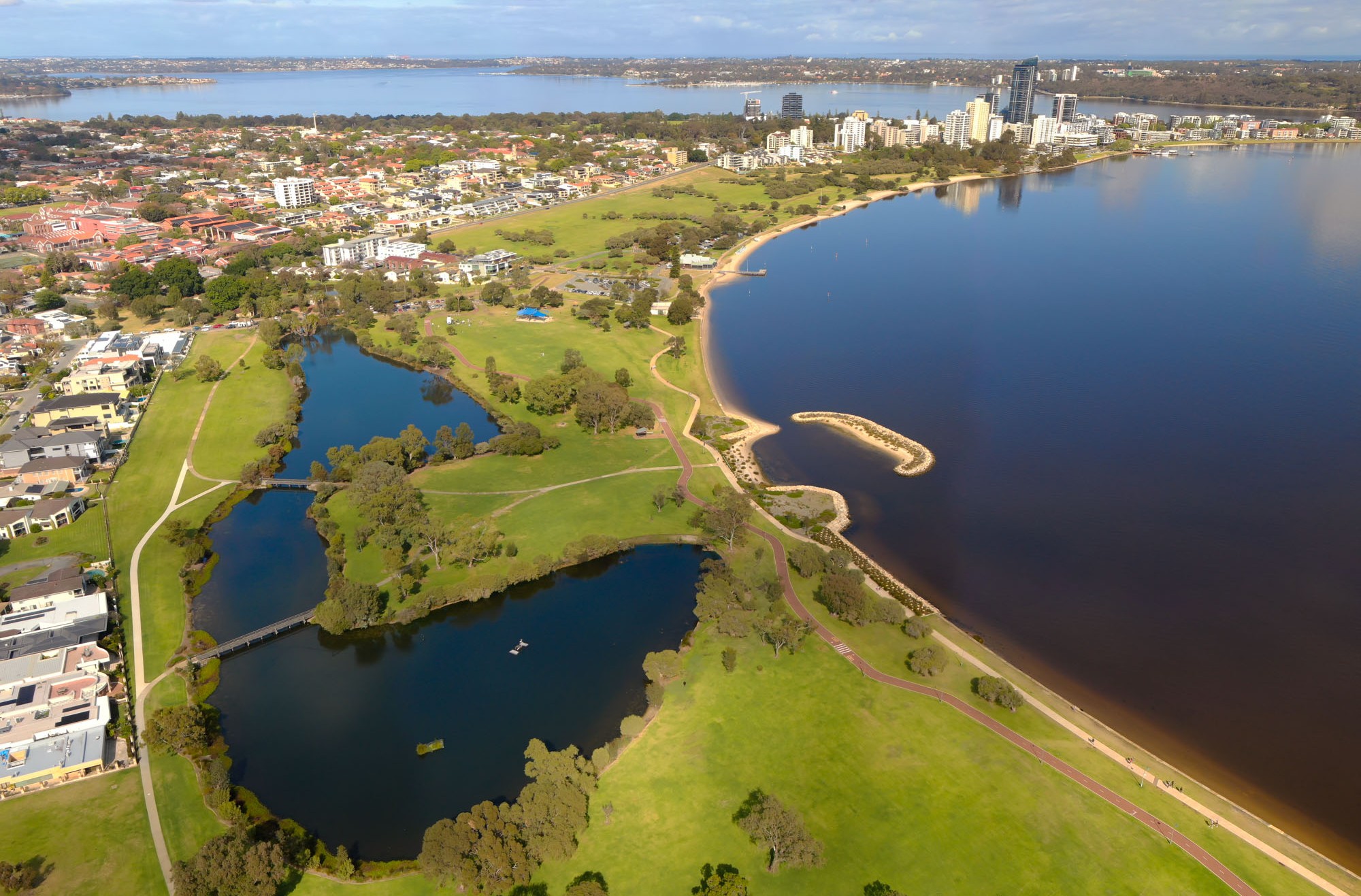 Aerial view of Sir James Mitchell Park alongside the Swan River.